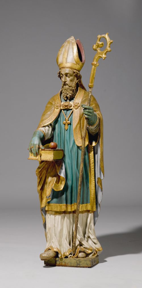 SAINT NICHOLAS,Baroque, from the Alpine region, Switzerland, beginning of the 17th century. Carved wood, painted later. The saint is dressed as a Bishop holding a book and an apple. H 133 cm. Some losses.