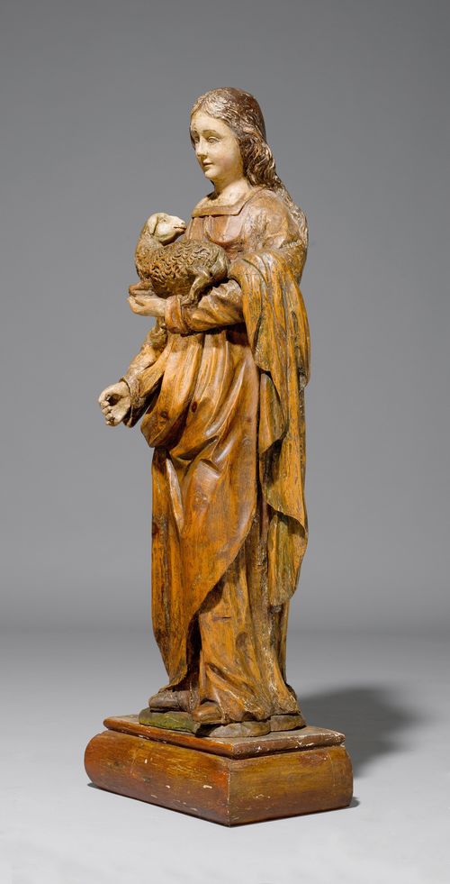 SAINT AGNES,from the Southern Alpine region, 19th century. Swiss pine, carved all-around and with traces of paint. The saint is holding a lamb in her left arm. H 114 cm.