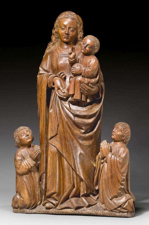 MADONNA WITH CHILD,Gothic, Northern France/Flanders, circa 1500. Carved walnut, verso flat. H 78 cm. Originally was painted. Child's fingers slightly chipped. Provenance: - Max Knoell, Basel, 1980.