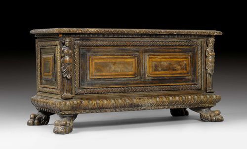 CHEST,Renaissance style, Tuscany, in part using older components. Walnut, carved with decorative frieze and inlaid with rectangular reserves. Rectangular body with hinged top. Panelled front, the corners decorated with caryatids. The sides likewise panelled. 108x40x55 cm. Requires some restoration.