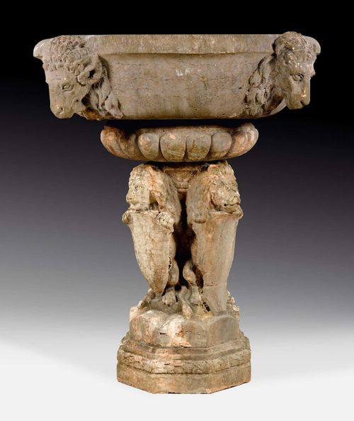 IMPORTANT FOUNTAIN "AUX LIONS", Renaissance, Northern Italy, 17th century. "Rosso di Verona" marble. With lion and ram heads. Some weathering and losses. D 120 cm, H 125 cm.