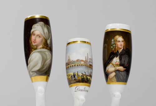 3 PORCELAIN PIPE BOWLS,Meissen and Thuringia, 19th century. Painted with a view of Dresden (Meissen), a portrait of a girl (Meissen), a view after a design by Raphael (Thuringia). L 10cm, 13 cm. (3)
