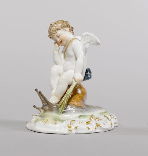 CUPID WITH "SNAIL" MAIL,Meissen, ca. 1900. Cupid riding on a snail, with a package tied to his shoulders, on a rocaille base accentuated in gold. Underglaze blue sword mark with pommels, model number S171 incised, press number. H 9 cm.