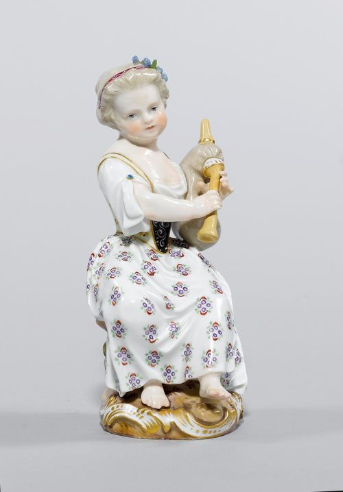 GIRL PLAYING BAGPIPES,Meissen, ca. 1880. Girl dressed in a farmer's garb, seated on a rocaille base accentuated in gold. Underglaze blue sword mark with pommels, model number 2558 incised, press number, painter's number 19 in iron-red. H 12.5 cm. Some restorations.