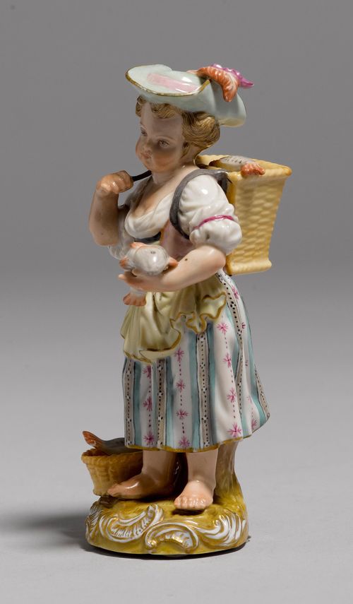 FIGURE OF A SMALL FISH MONGER,probably Meissen, after 1900. Wearing a turquoise hat, carrying a basket of fish on her back. Underglaze blue sword mark with pommels, no model number, painter's number in iron-red. H 13.7 cm.