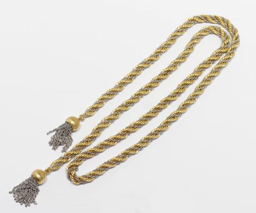 GOLD SAUTOIR. Yellow and white gold 750, 172 g. Corded, bicolour gold chain, with 2 tassels in white gold. L ca. 106 cm.