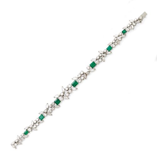 EMERALD AND DIAMOND BRACELET, ca. 1960. White gold 750. Set with 7 step-cut emeralds, weighing ca. 1.70 ct in total, and 30 marquise-cut diamonds and 50 brilliant-cut diamonds weighing ca. 6.30 ct in total, 1. L ca. 17 cm.