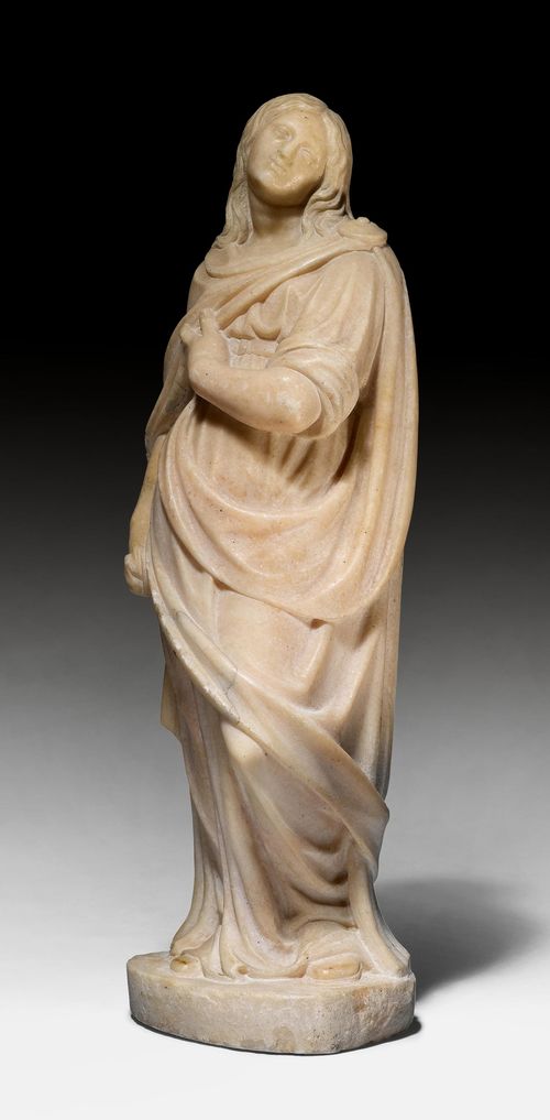 SAINT MARY MAGDALENE, Lombardy, beginning of the 17th century. Light coloured marble, carved, and verso flattened. The saint is standing with her hair open and wearing a garment, with her head turned to the left. H 61 cm. Repair to one fold of the garment. Provenance: - from a private collection, Zurich.