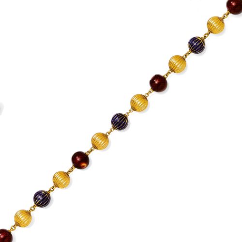 ENAMEL AND GOLD SAUTOIR. Yellow gold 750, 216 g. Necklace of red and blue enamelled beads, alternated with gold beads. Enamel with signs of wear. L ca. 147 cm.