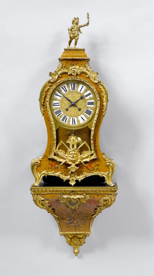 A SMALL PAINTED CLOCK WITH PLINTH,