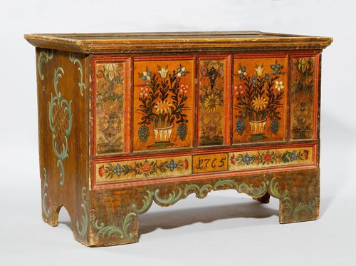 PAINTED CHEST,from the Alpine region, probably Bavaria or Tyrol, dated 1765. Wood, painted with bouquets of flowers and garlands, partly in the Arte povera style. Rectangular body with hinged cover. Panelled front. 125x61x85 cm.