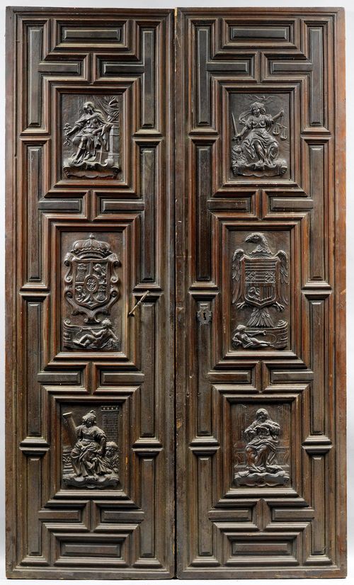 PANELLED DOUBLE-DOORS,in the Renaissance style, Italy or Spain, 19th century. Pinewood and hardwood, carved with depictions of the Cardinal Virtues in rectangular reserves and 2 coats-of-arms, one of which is crowned, the other bearing an eagle. Dark patinated. 70,5x240 cm.