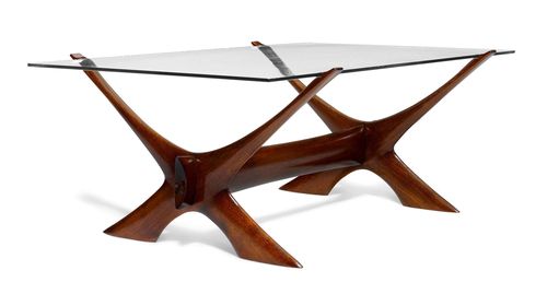 ILLUM WIKKELSO (1919 - 1999), SALON TABLE, circa 1960 for Soren Willadsen. Rosewood and glass. 137x86x54 cm.