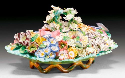 INKSTAND WITH FLORAL APPLICATIONS, Meissen (?), 19th century.Inkwells in the form of flowers with floral lids and each with a bee finial. Underglaze blue sword mark and I. D 25cm. Minor chips and restored.