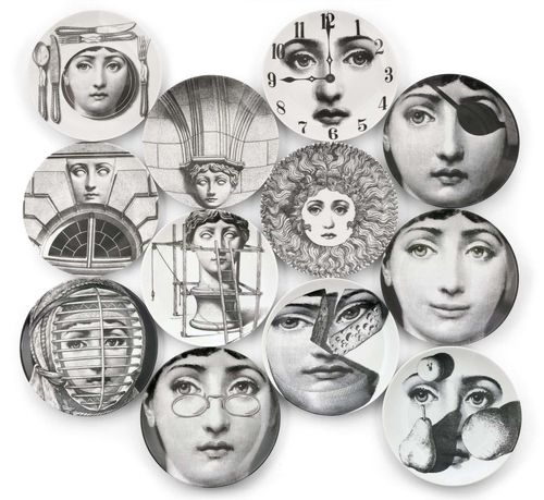 PIERO FORNASETTI (1913 - 1998) SET OF 12 PLATES, Model "Tema & variazioni", designed in 1951-60. Later editions circa 1990. Porcelain with black and parcel gilt decoration. D 26 cm. N° : 8, 74, 106, 155, 200, 203, 212, 218, 235, 266, 290, 313.