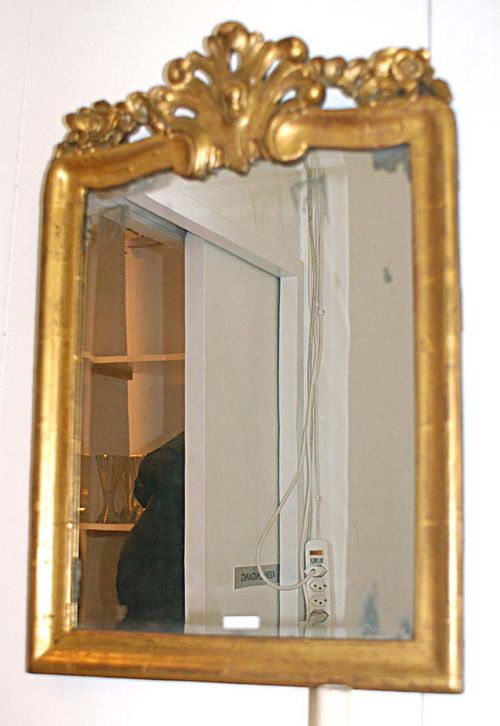SMALL CARVED AND PIERCED GILT WOOD MIRROR, Louis XV, Bern, 18th century. H 69 cm, W 51 cm.
