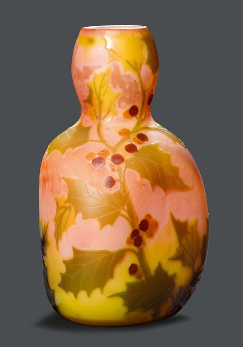 LEGRAS VASE, circa 1910 Pink glass with yellow and green overlay and etching. Pear-shaped, decorated with mistletoe. Signed Legras. H 21 cm.