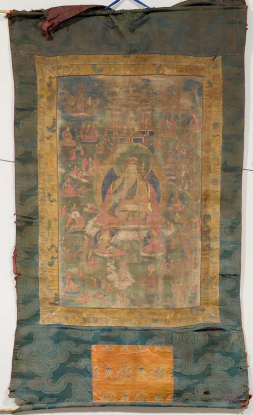 A THANGKA OF PADMASAMBHAVA AS GURU RIMPOCHE. Tibet, 18th c. 67x40 cm. Severely faded and worn. Brocade mounting.