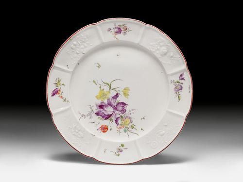A PLATE WITH PAINTED FLOWERS,