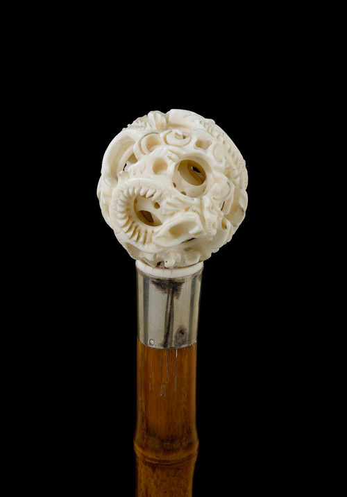 A WALKING STICK WITH SPHERICAL HANDLE,