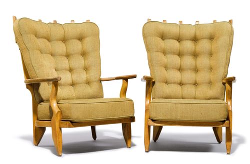 ROBERT GUILLERME & JACQUES CHAMBRON (1913 - 1990) (1914 - 2001) PAIR OF ARMCHARIS, "Grand Confort" model, designed ca. 1950 for Votre Maison. Oak with green/brown padded fabric cover. 78x88x105 cm.