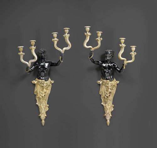 PAIR OF IMPORTANT SCONCES, Regency style, Paris. Gilt bronze and burnished bronze. With a male figure and with a female figure, each in a cornucopia. Each with 2 pairs of leaf-shaped drip pans and vase-shaped nozzles. H 90 cm. Fitted for electricity.