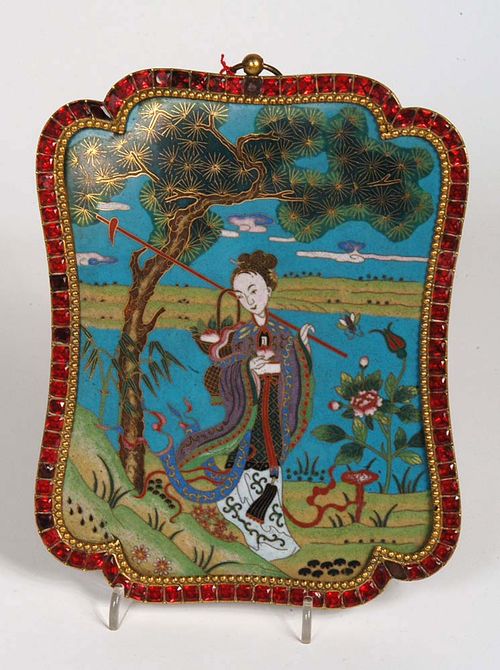 CLOISONNÉ PAINTING in shaped frame with a series of red glass beads. Woman with the peaches of immortality in a basket. She is walking under a pine. In the background:  Peony bush and a Lingzhi mushroom. Cloisons are fire-gilded. China, 19th century. H 21 cm. Berti Aschmann Collection.