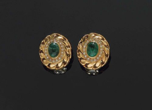 EMERALD AND  DIAMOND CLIP EARRINGS, E. MEISTER. Yellow gold 750. Set with 2 oval emerald cabochons totalling ca. 3.00 ct, surrounded by 36 diamonds totalling ca. 0.20 ct Matches previous lots.