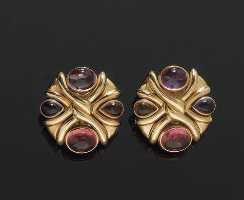 GEMSTONE CLIP EARRINGS, BULGARI, 1988. Yellow gold 750. Each with 4 different gemstone cabochons: 1 tourmaline, 1 citrine, 1 amethyst and 1 iolith totalling ca. 13.50 ct. Signed and dated. Matches previous lot, With case and copy of insurance estimate.