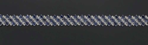 SAPPHIRE AND BRILLIANT-CUT DIAMOND BRACELET. White gold 750. Set with 66 diagonally arranged oval sapphires totalling ca. 29.90 ct and with attractive even colour, between 199 brilliant-cut diamonds totalling ca. 1.95 ct.L ca. 18 cm. W ca. 1.45 cm.