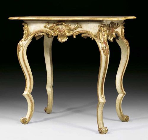 PAINTED CENTRE TABLE, Louis XV, German, 18th century Richly carved wood with cartouches, painted white and parcel gilt, richly shaped probably later top "en faux marbre" 85x51x76 cm. Provenance: from a German collection.