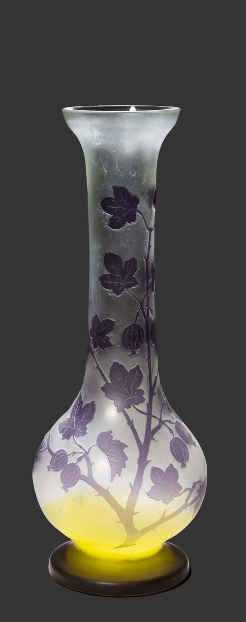 FRITZ HECKERT VASE, circa 1910 Colourless glass with violet overlay and etching. Trumpet form with gooseberry decoration. Signed F.H. H. 32.5 cm.