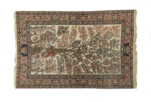 ISFAHAN old. White central field decorated with tree of life, a bird and bright flowers, black border. Good condition.205x117 cm.