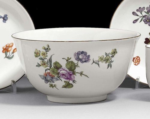 SLOP BOWL, Meissen, circa 1750. Painted with bouquets of Deutsche Blumen, rim edged in brown, crossed swords in underglaze-blue, impressed numeral, 16cm, slightly rubbed.