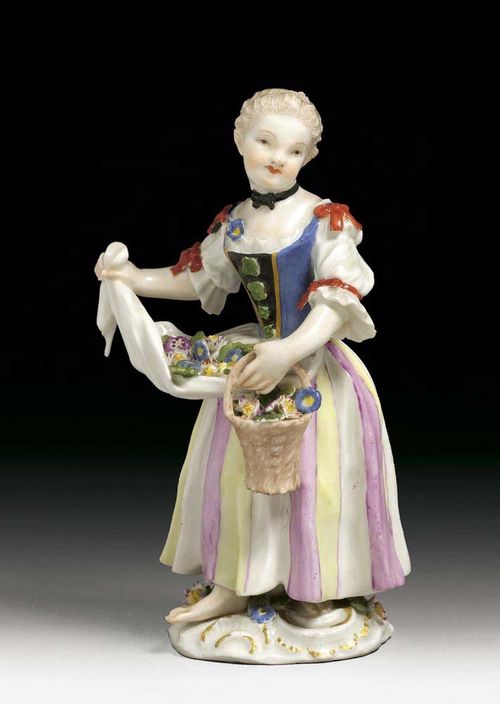FLOWER GIRL, Meissen, mid 18th century. Model J.J.Kändler,  with a blue waist coat  and striped skirt, her white apron filled with flowers, traces of crossed swords in underglaze-blue, impressed numeral 22, 13,5cm, slightly chipped.
