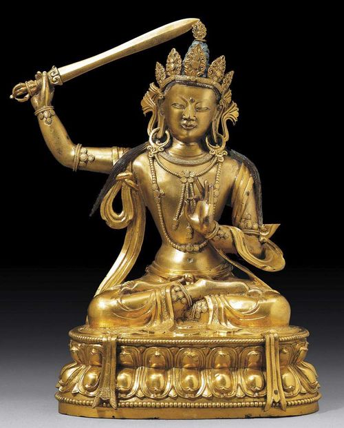 GILT BRONZE FIGURE OF MANJUSHRI. Sino-Tibetan, 18th century.  H 33 cm.