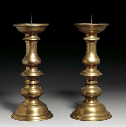 PAIR OF LARGE BRASS CANDLE HOLDERS, Baroque, German, 18th century H 47 cm. Provenance: from a Swiss collection.