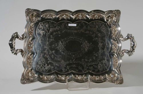 TRAY WITH HANDLES. Vienna 1857. Firma Triesch & CO, Vienna. With chased and embossed floral and foliate ornament. The well engraved with central cartouche. 54.5x33 cm.