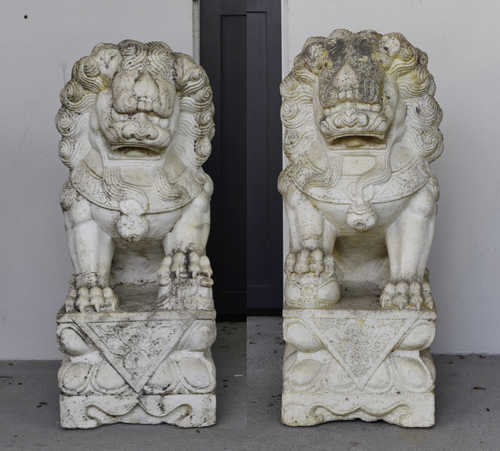 A PAIR OF IMPOSING MARBLE PALACE LIONS ON LOTUS PEDESTALS.