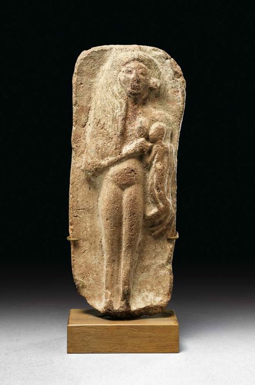 WOMAN WITH CHILD, Egypto-Roman, 1st century AD Terracotta with remains of paint, in relief, probably Isis or Demeter, the back flat. Mounted on wooden plinth. H 22 cm. Provenance: Private collection Zürich, acquired in the 1950s from E. Borowski, Basel.