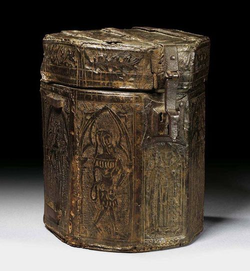 SALT BOX, Gothic, France circa 1600. Finely embossed leather with dark finish. With hinged lid and fine ornamental iron straps and iron lock. 19x16x24 cm. Provenance: Private collection, West Switzerland