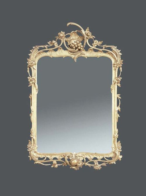 PIERCED AND CARVED GILTWOOD MIRROR, Louis XV, probably German circa 1760. With some wear. H 80 cm, W 46 cm. Provenance: German private collection