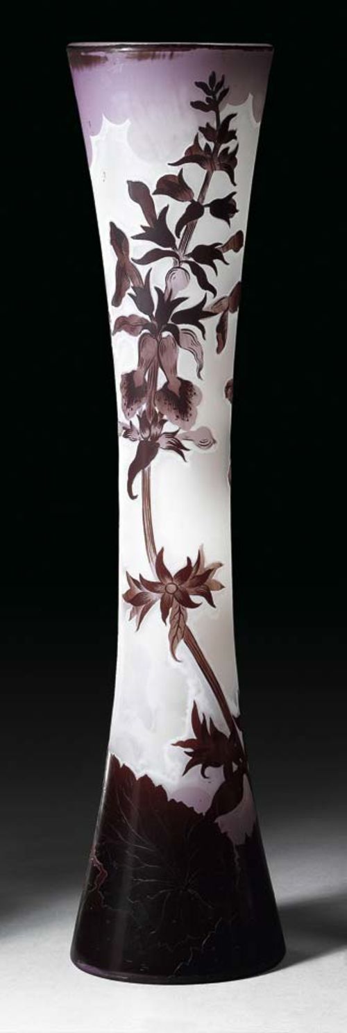 VASE, Gallé. White glass with triple overlay in white, violet and red, etched with orchids,  signed Gallé, H. 56.5 cm.