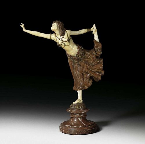 WOOD AND IVORY SCULPTURE OF AN EGYPTIAN DANCER, Cl. J.R. Colinet, ca. 1920. On round marble plinth. Signed Cl. J. Colinet, H. 43.5 cm.