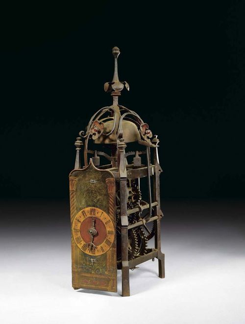 PAINTED SALON CLOCK, Gothic, South German circa 1550. Open rectangular case, bound with 2 horizontal bands, tall red painted bell cage with floral ornament, architectural style dial, movement and striking mechanism with iron wheels and balance, also countwheel with gears inside. With restorations, paintwork probably later. 15x22x56 cm. Provenance: O. Honegger collection  Zurich.