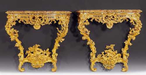PAIR OF CONSOLES "AUX SYMBOLES DE CHASSE",Louis XV, from a Paris master workshop, circa 1745. Pierced and finely carved with turtle doves, eagles, hunting dogs, flowers, leaves and cartouches, with richly shaped "Brèche d'Alep" top.  100x35x96 cm. Provenance: - collection of Comte Gaston Baconnière de Salverte (1827-1886), Paris. - Galerie Georges Petit auction Paris on 5./6.5.1887 (Lot No. 136+137). - French collection. - Ader/Tajan auction Paris on 29.3.1994 (Lot No. 66). -  "Art of France" auction Christie's New York on 21.10.1997 (Lot No. 189). - Château de Vincy, West Switzerland. Highly important pair of perfect quality and elegance.