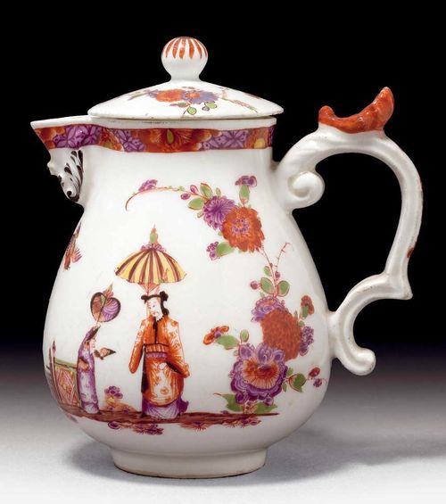 CHINOSIERIE-DECORATED MILK JUG, Meissen, circa 1735.With rocaille handle and applied shell, painted in iron red in the style of J.E. Stadler. Painted on both sides with Chinese figures on a terrace, with Indianische Blumen. The spout with acanthus leaf decoration in relief, heightened in black. Underglaze blue sword mark. H 12cm. The lid probably from a different set and with small restoration. Provenance: from a private collection, Solothurn