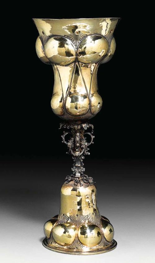 SILVER-GILT KNOPPED CUP. Zurich 1st half 17th century Maker's mark probably Hans Ulrich Oeri I. Cast, chased and embossed. The shaft with 7 knops and the cup with 6 knops.  H 25 cm. . Provenance: - Formerly collection of  Eschmann family. - Swiss private collection.