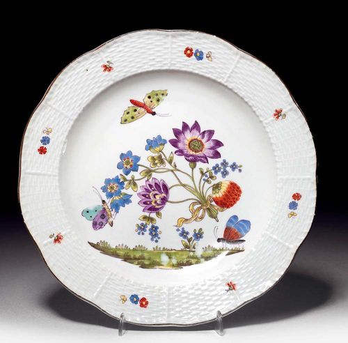 PLATE WITH 'BIENENMUSTER', Meissen, circa 1740.The waved edge with basket weave relief, painted with bees and oriental flowers, the edge with scattered flowers in Kakiemon style. Underglaze blue sword mark. D 24cm. Provenance: from a private collection, Solothurn