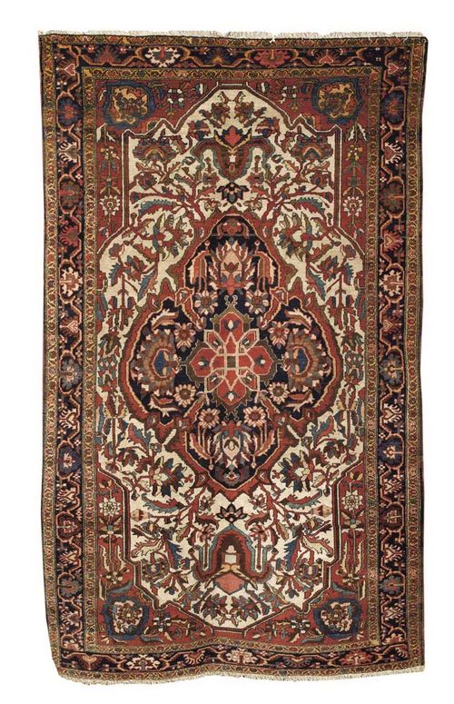 FERAHAN old. Attractive collector's piece with white ground and blue red central medallion and red corners, decorated with stylised trailing flowers, dark blue border. Good condition. 215x130 cm.